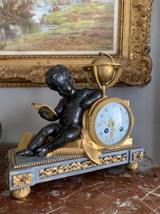 Pendule à l'enfant astronome